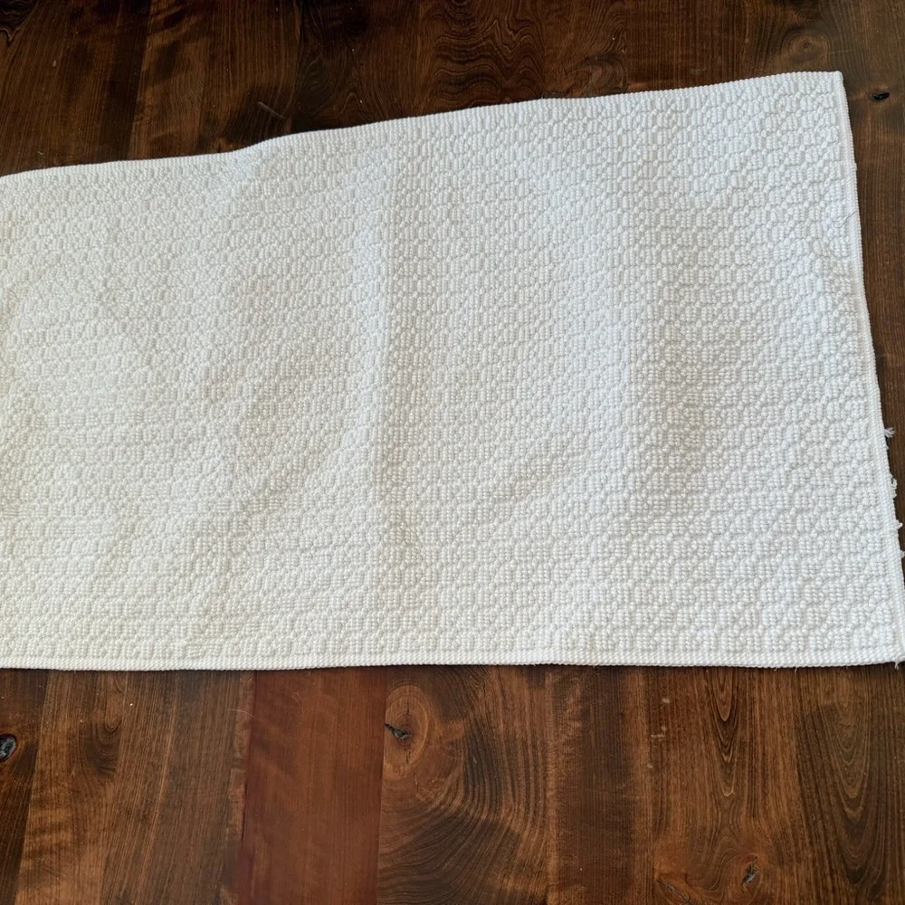 Bright white rug 34 by 20 does have some light fray  on edges.